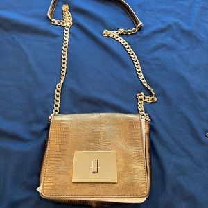 Gold Cole Haan bag